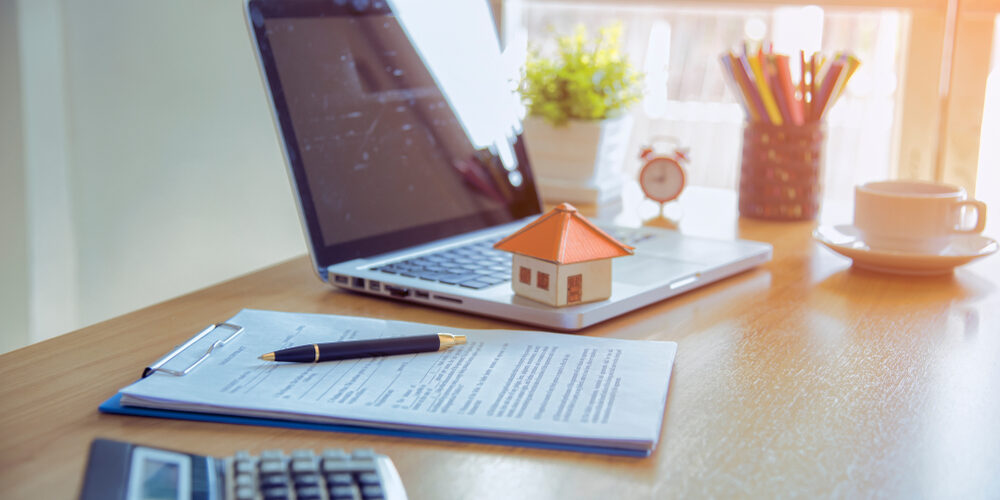 Model,House,For,Sale,And,Graphs.,Real,Estate,Concept.