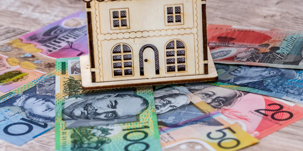 House,Model,With,Australian,Dollar,Banknotes,On,Table