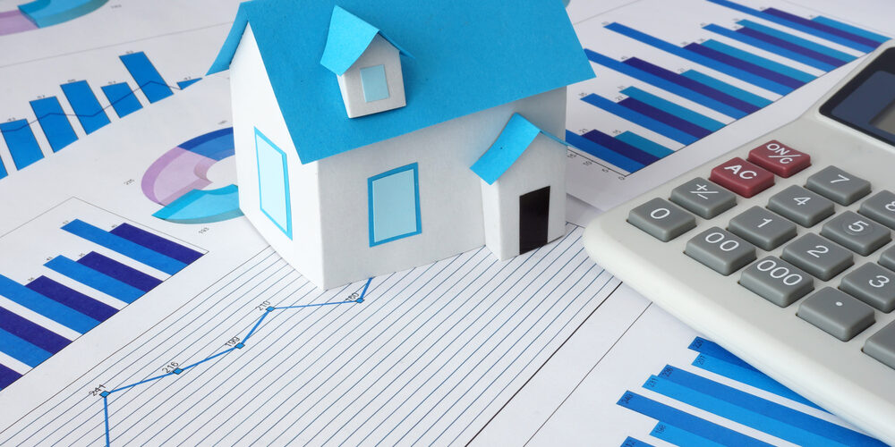Model,House,For,Sale,And,Graphs.,Real,Estate,Concept.
